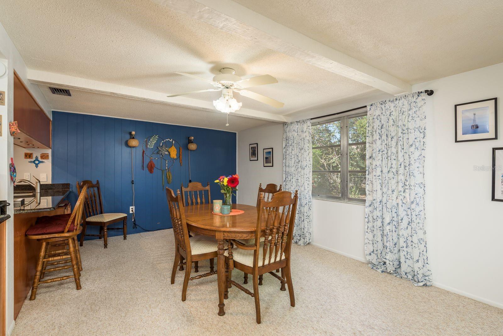 Breakfast bar & family room (now obviously used as a dining room)