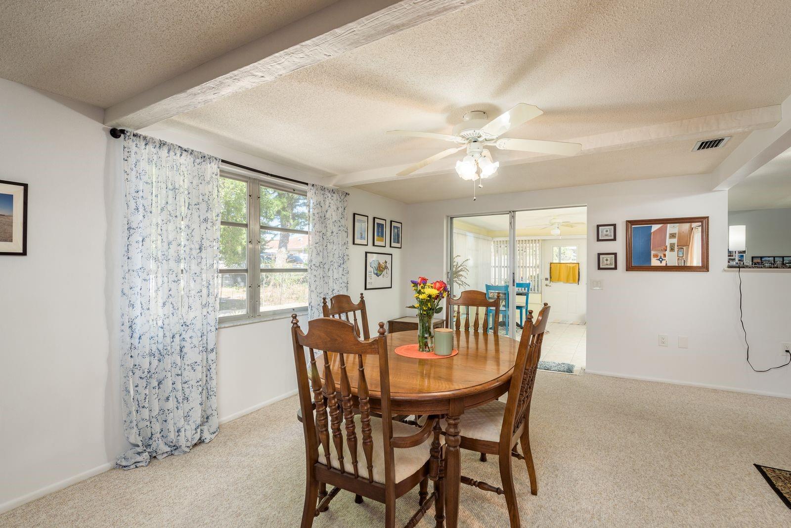 Family room showing sliders to Florida room.