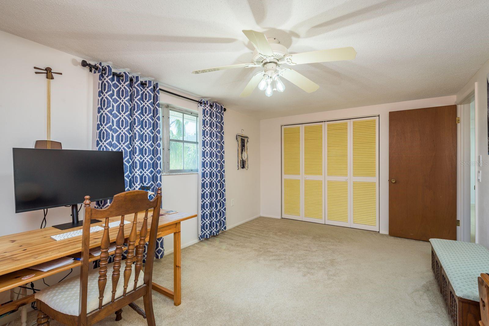 Spacious Primary bedroom has a large wall closet.