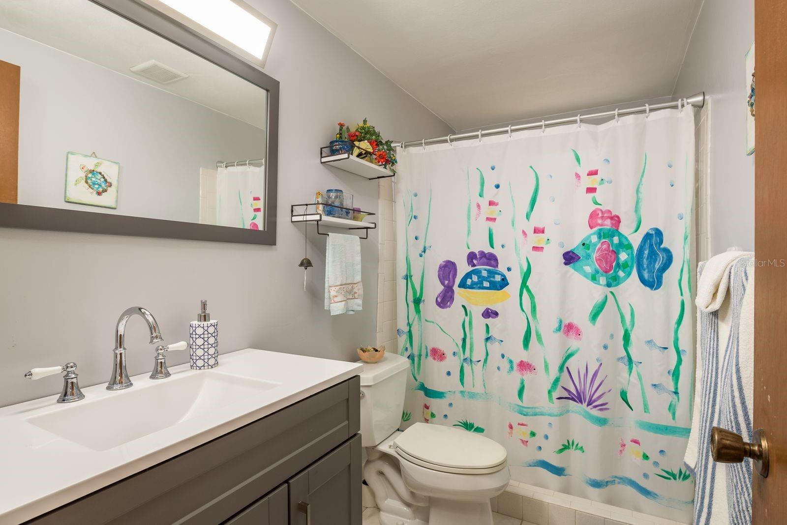 Nice updates in this bathroom with walk-in shower.