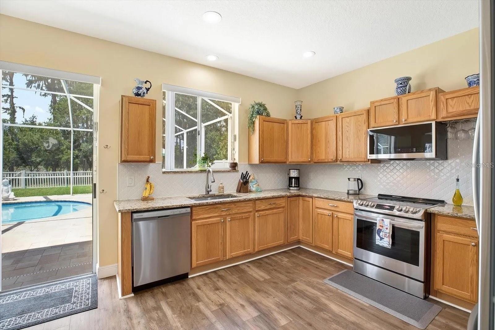 Kitchen overlooks pool area