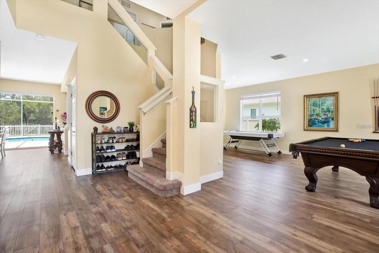 Elegant staircase with glass window stair railing