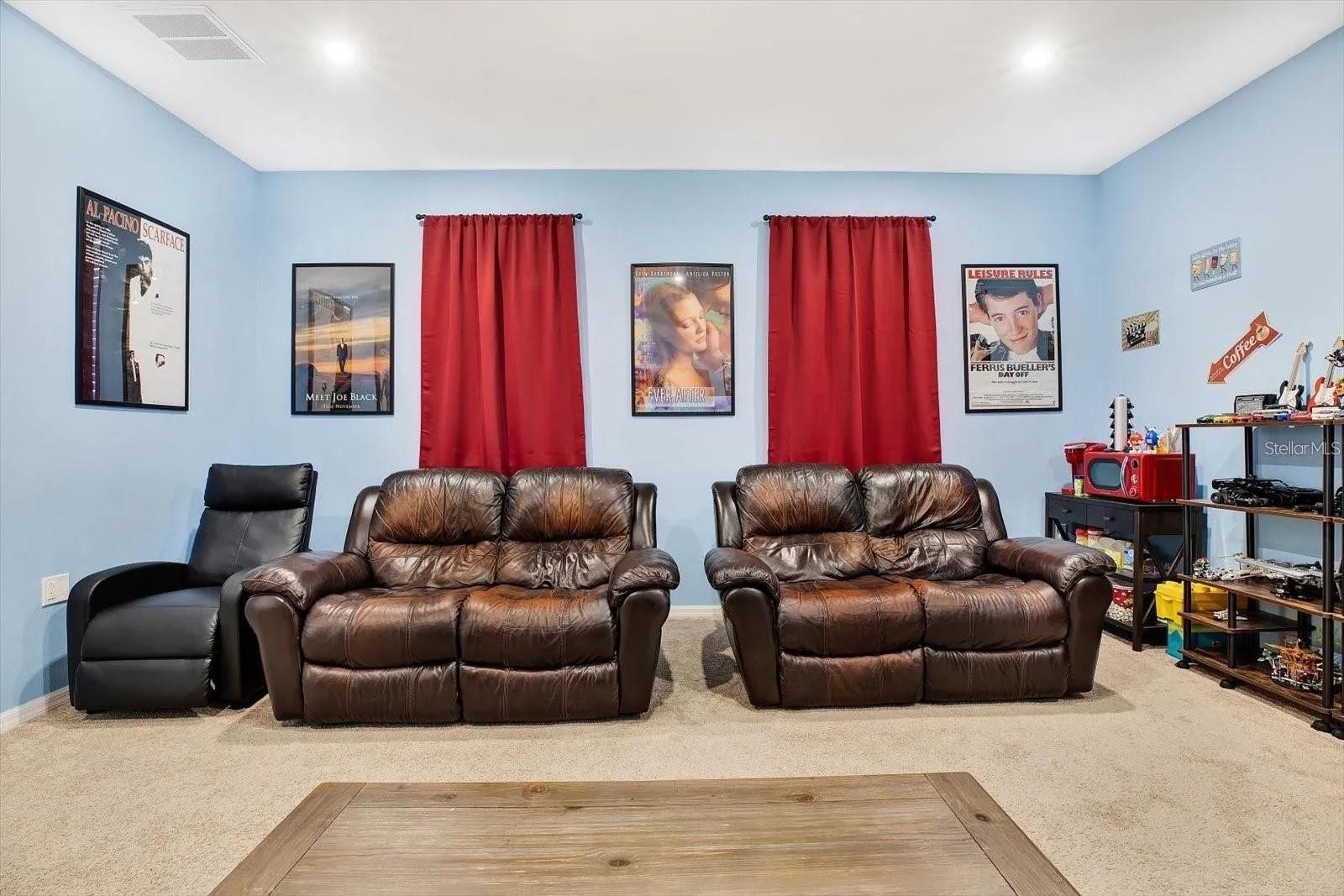 6th bedroom (also known as the theater room) with brand new carpeting replaced in November 2024