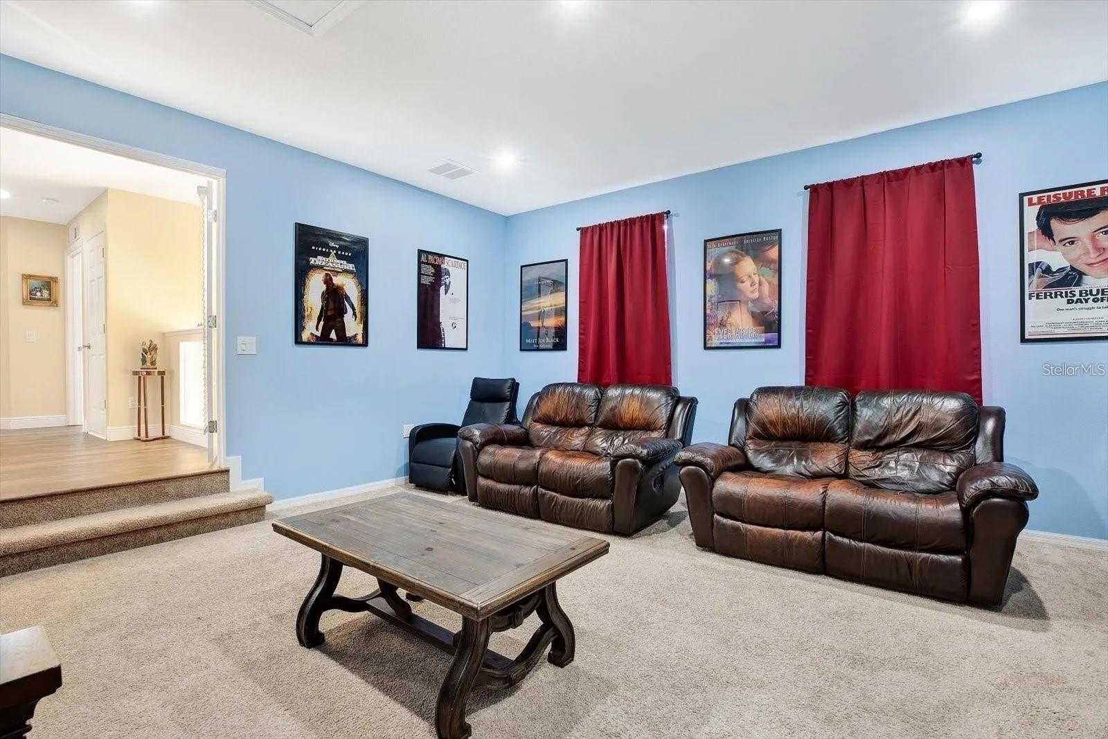 6th bedroom (also known as the theater room) with brand new carpeting replaced in November 2024