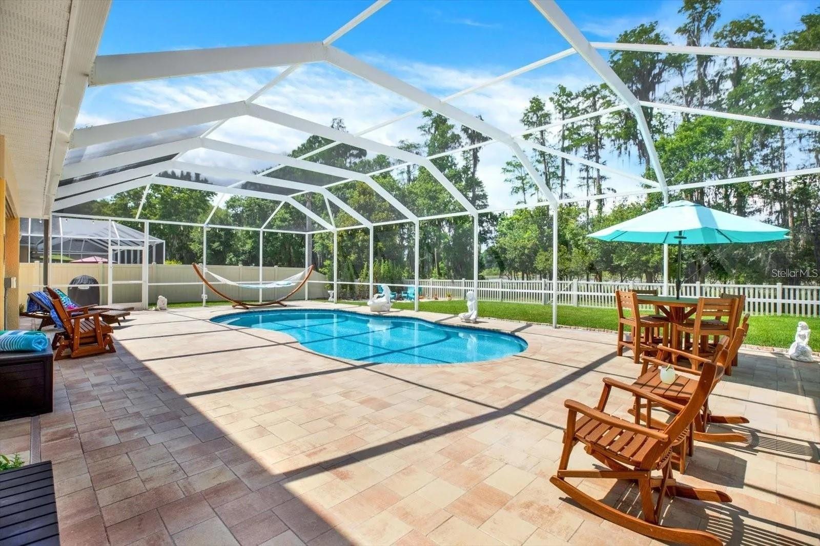 Oversized pool deck area perfect for patio furniture