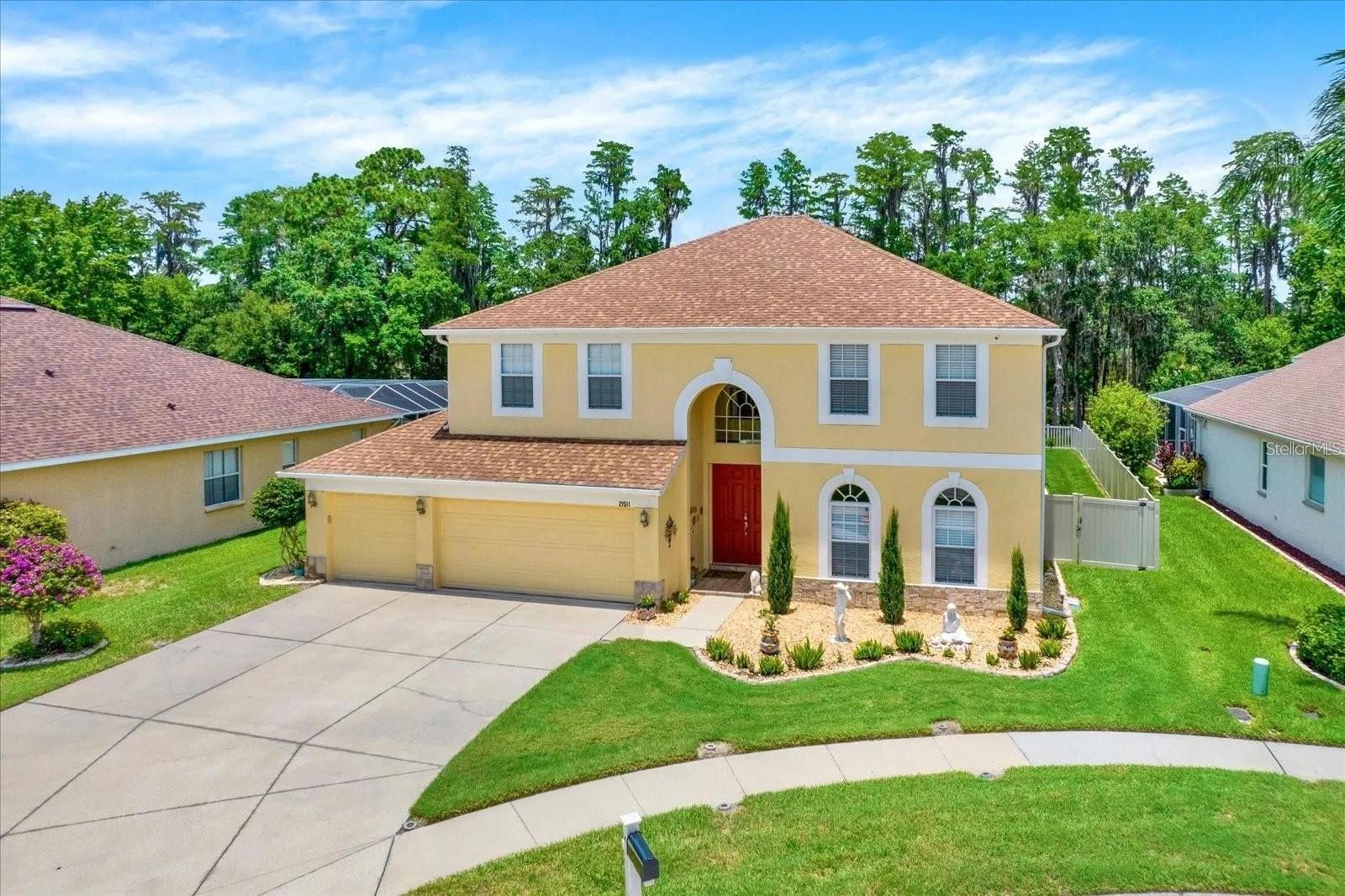 Oversized driveway excellent for parking numerous cars