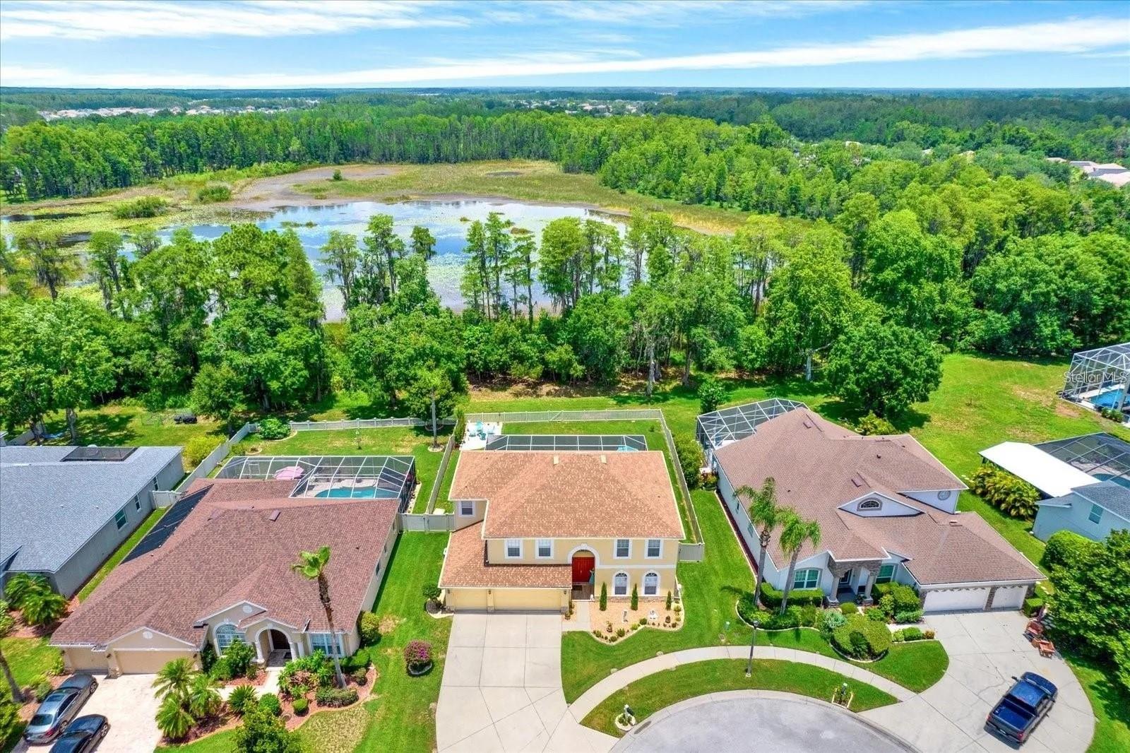 Home on a conservation with a lake in the back