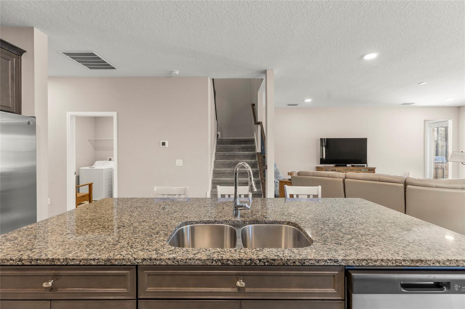 Kitchen island, overlooking the family room