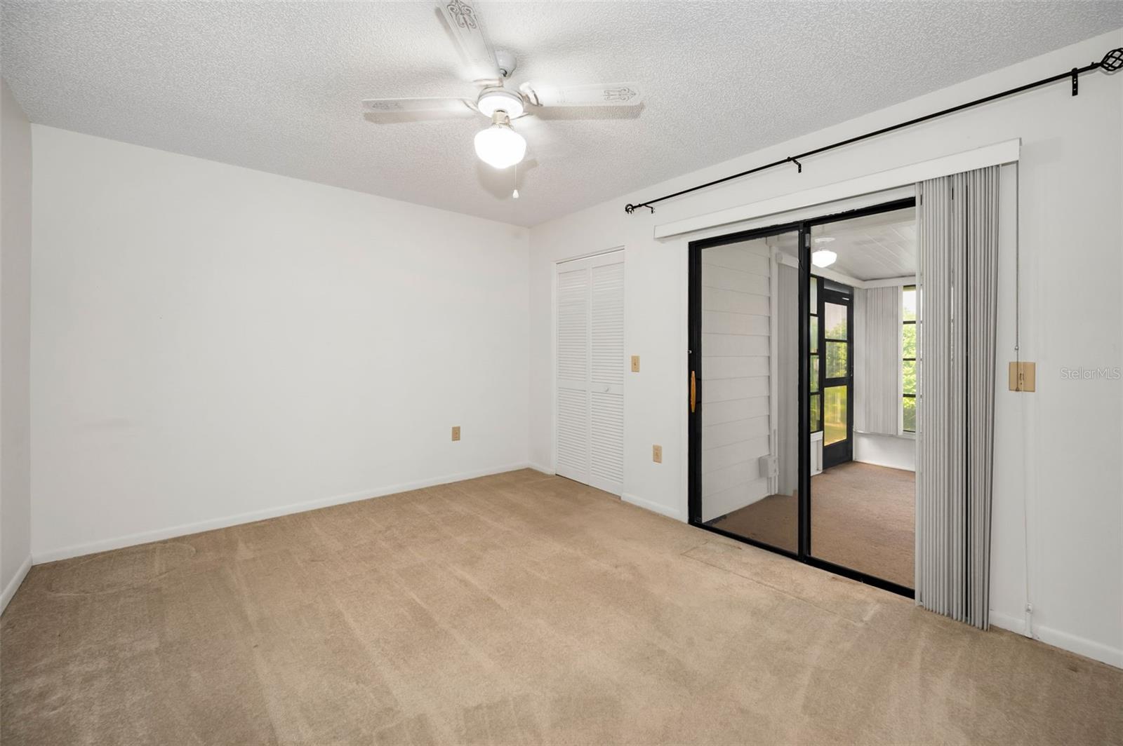 Bedroom 2 has access to the sunroom