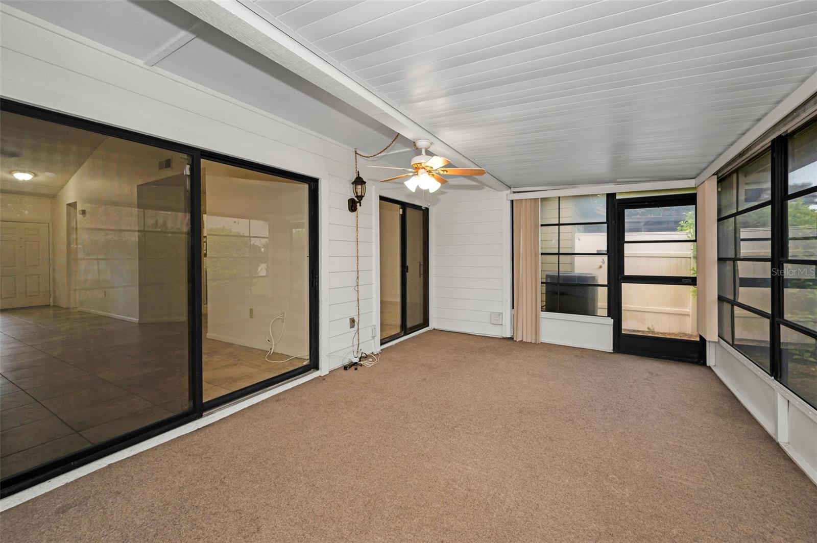 Sunroom with screens and vinyl windows