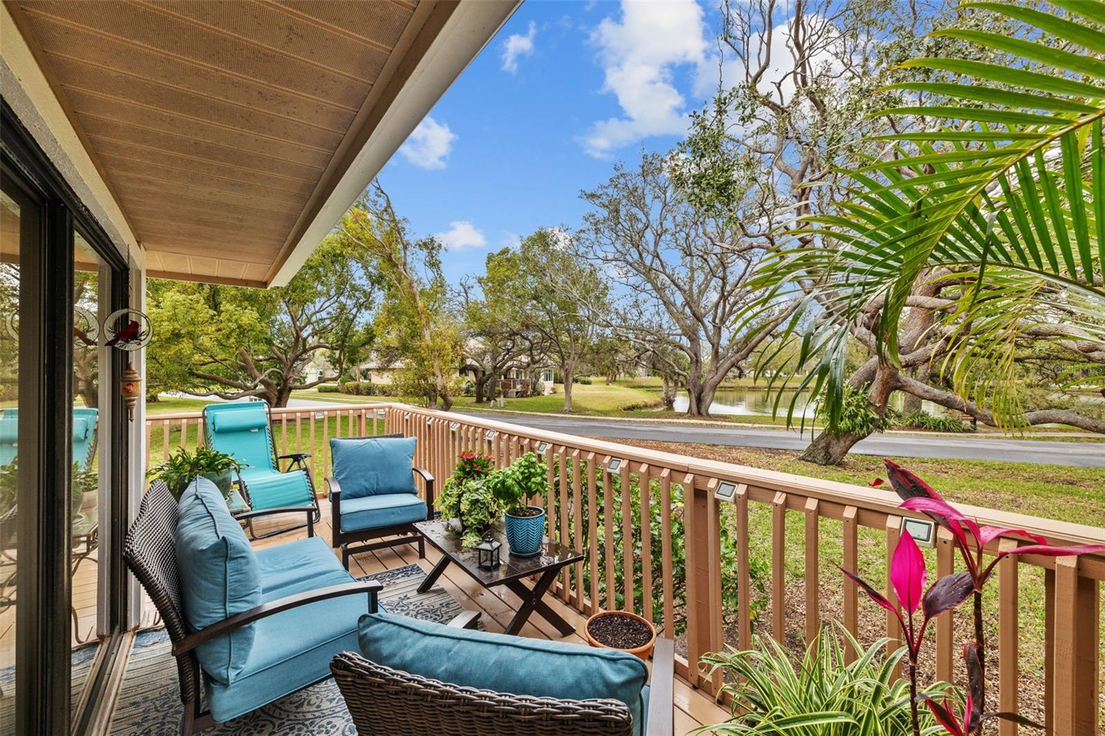 WRAP AROUND DECK WITH VIEW OF POND