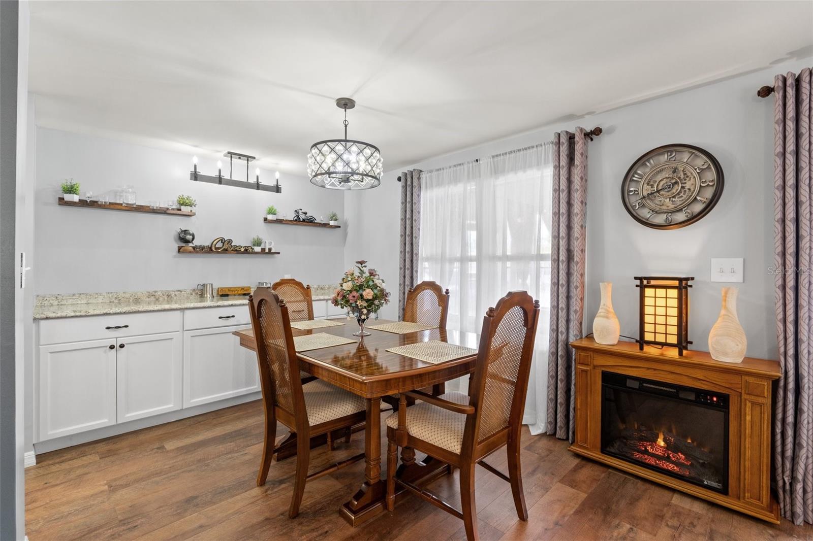 Formal Dining room - Fireplace, clock and decor excluded from sale