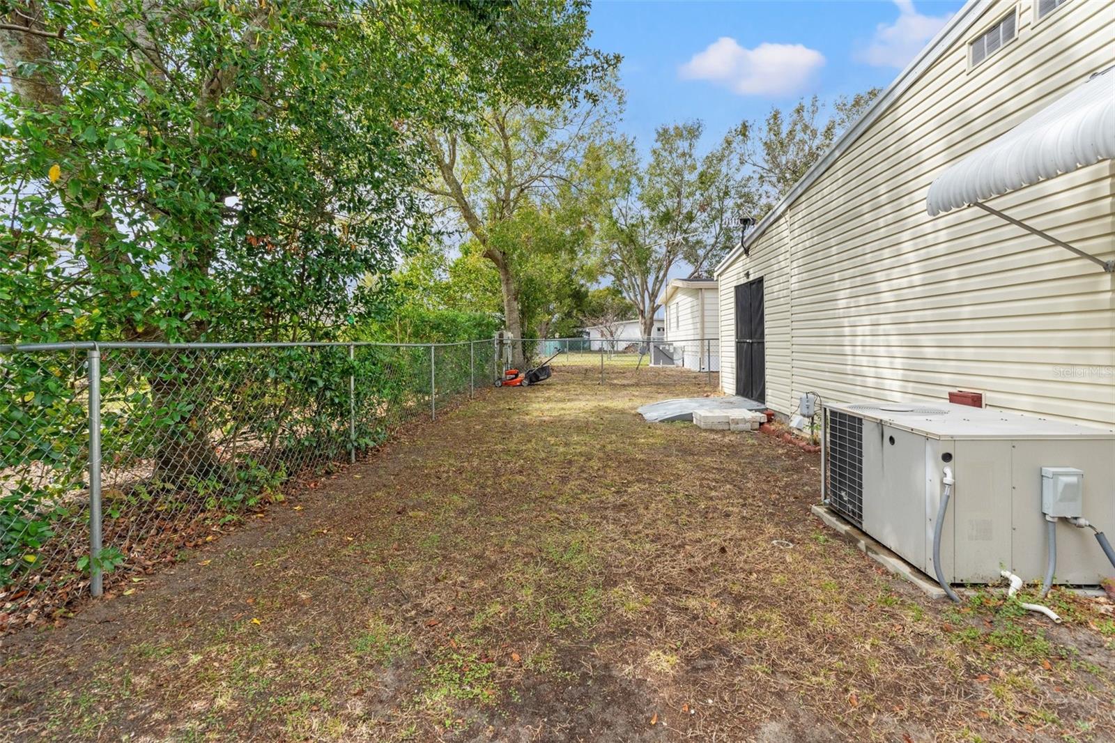 Fenced in portion of the back yard