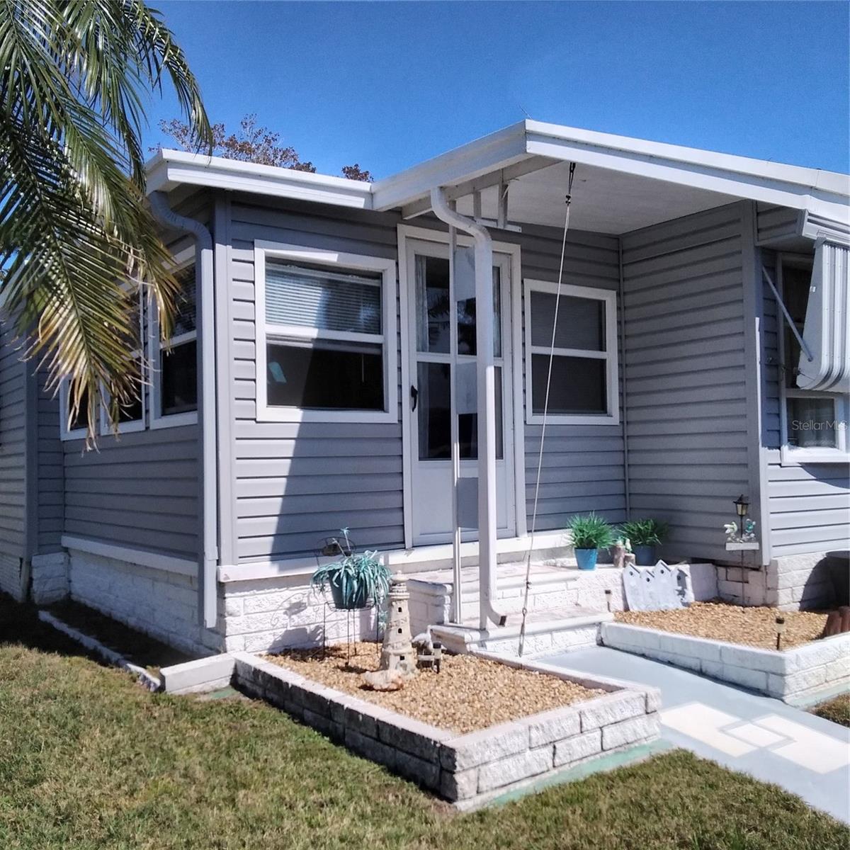 FRONT, ENTRANCE TO SUNROOM