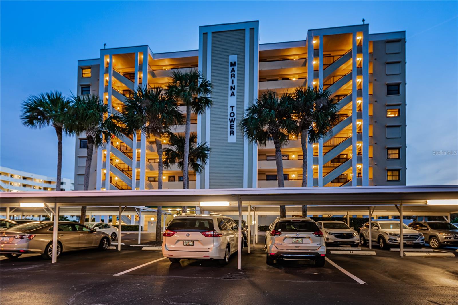 A beautiful twilight shot of Marina Tower.  The subject unit is on the 4th floor end unit with all the water views.