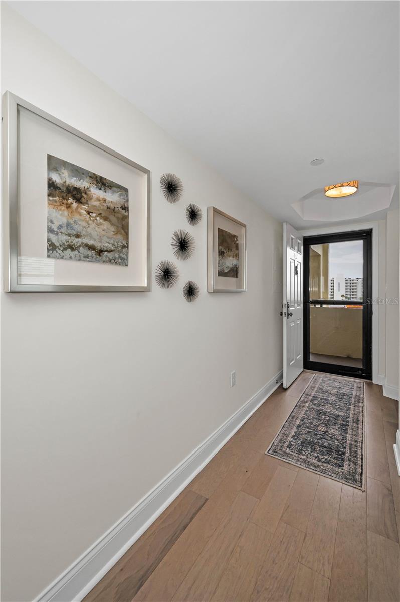 Entry Hallway to this well appointed unit.  Tray ceiling with entry hall light.