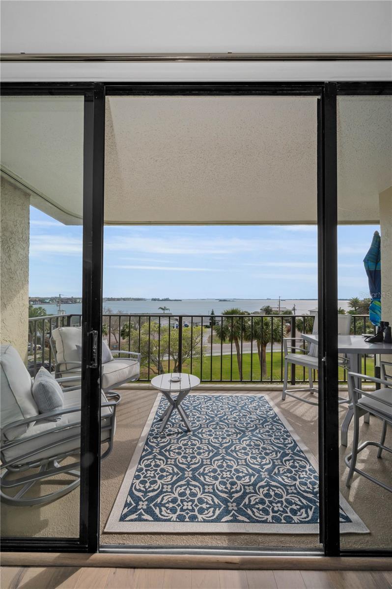 Now that's what I am talking about!  this balcony off the living room and master bedroom has views all the way south to the Clearwater causeway.  Look right and you can see hurricane pass out to the Gulf of Mexico with Caladesi & Honeymoon Island gracing both sides!