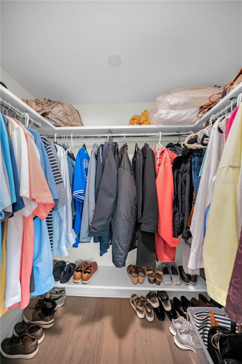 Primary Bedroom walk-in Closet  - his