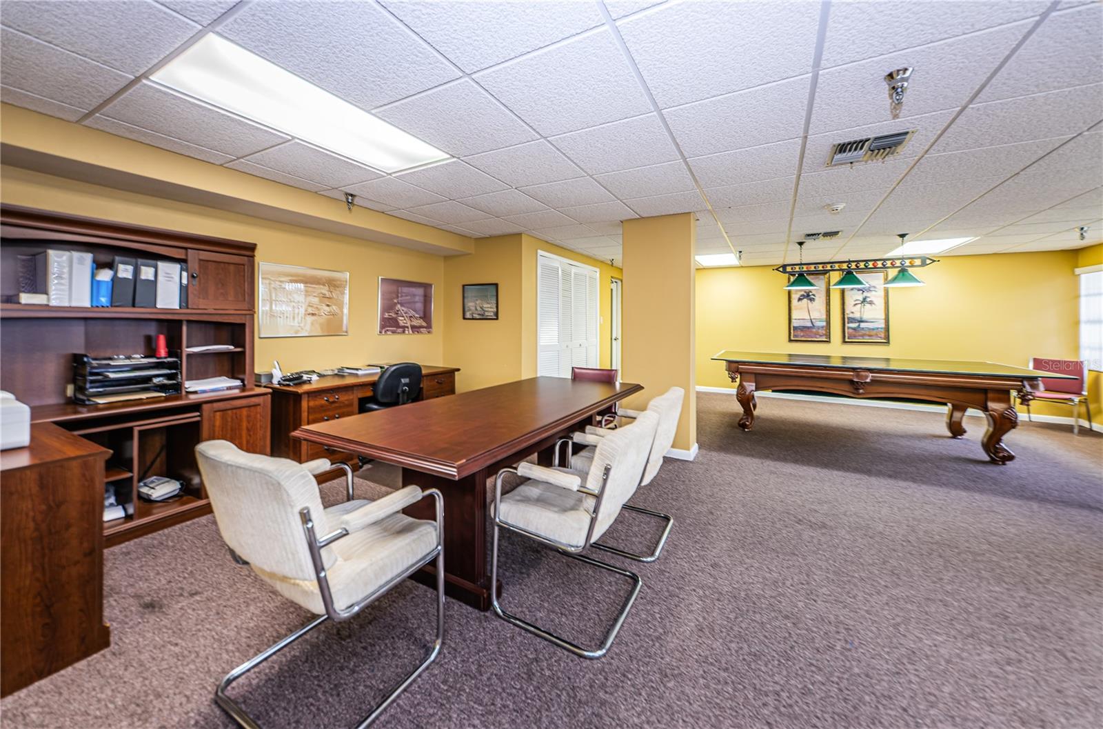 Pool table converts to a ping pong table in Clubhouse.  Office facilities area available for approving new applicants.