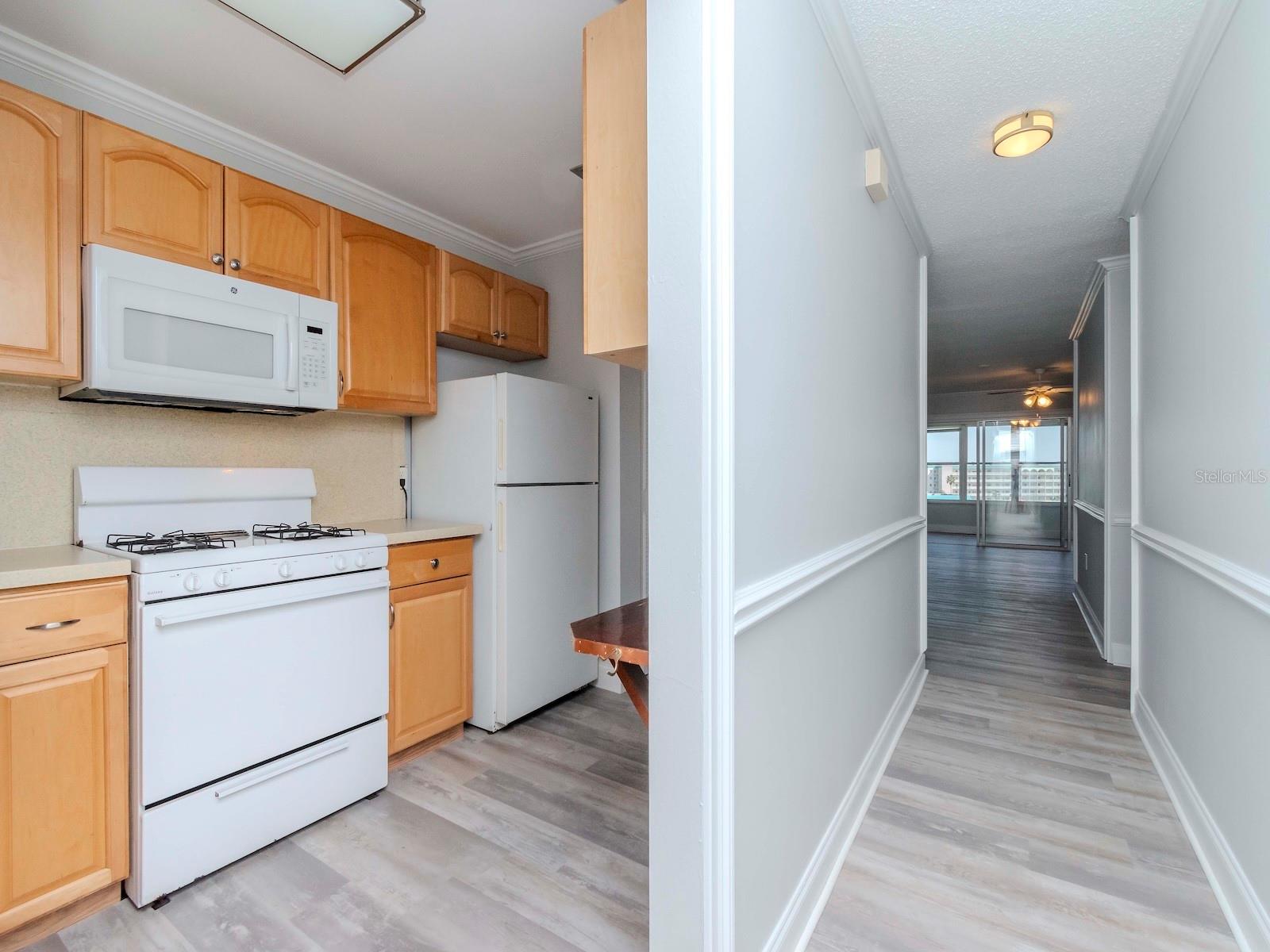 ENTRY WAY AND TO THE LEFT TO KITCHEN