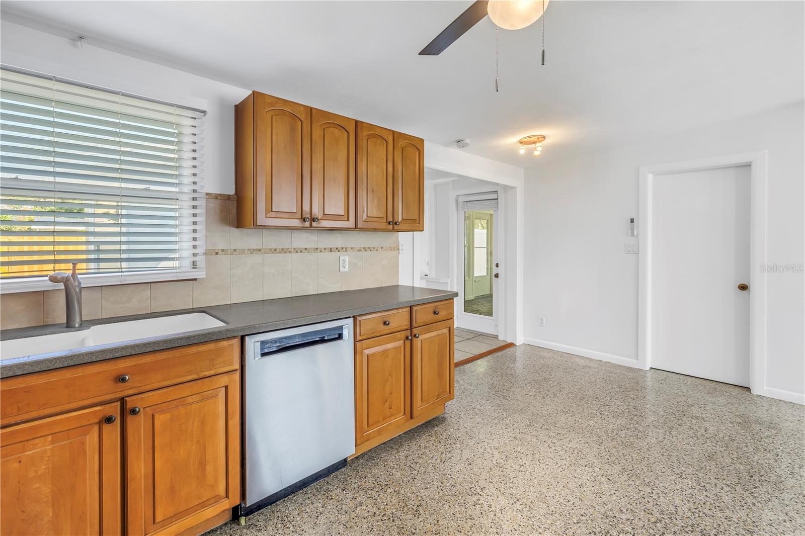 Kitchen leading to the large den.