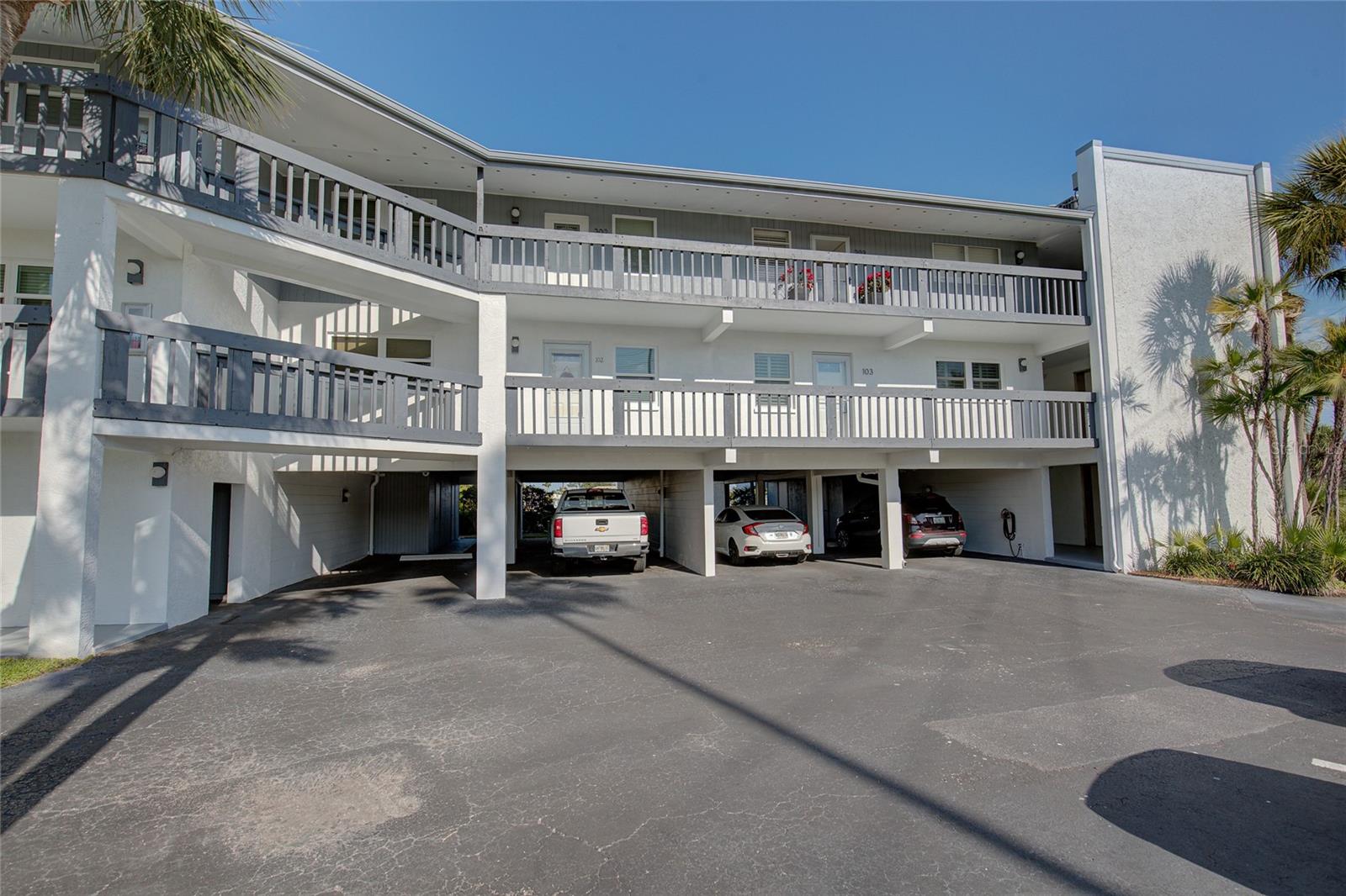 Covered parking spot and storage closet on first floor