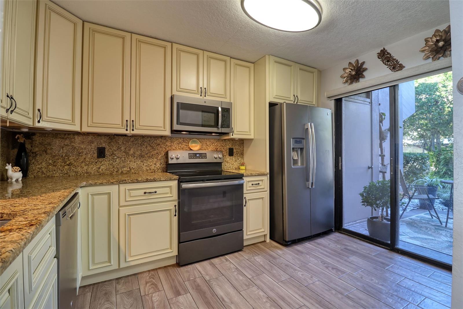 Granite on Counters & Walls!  (no grout to clean)