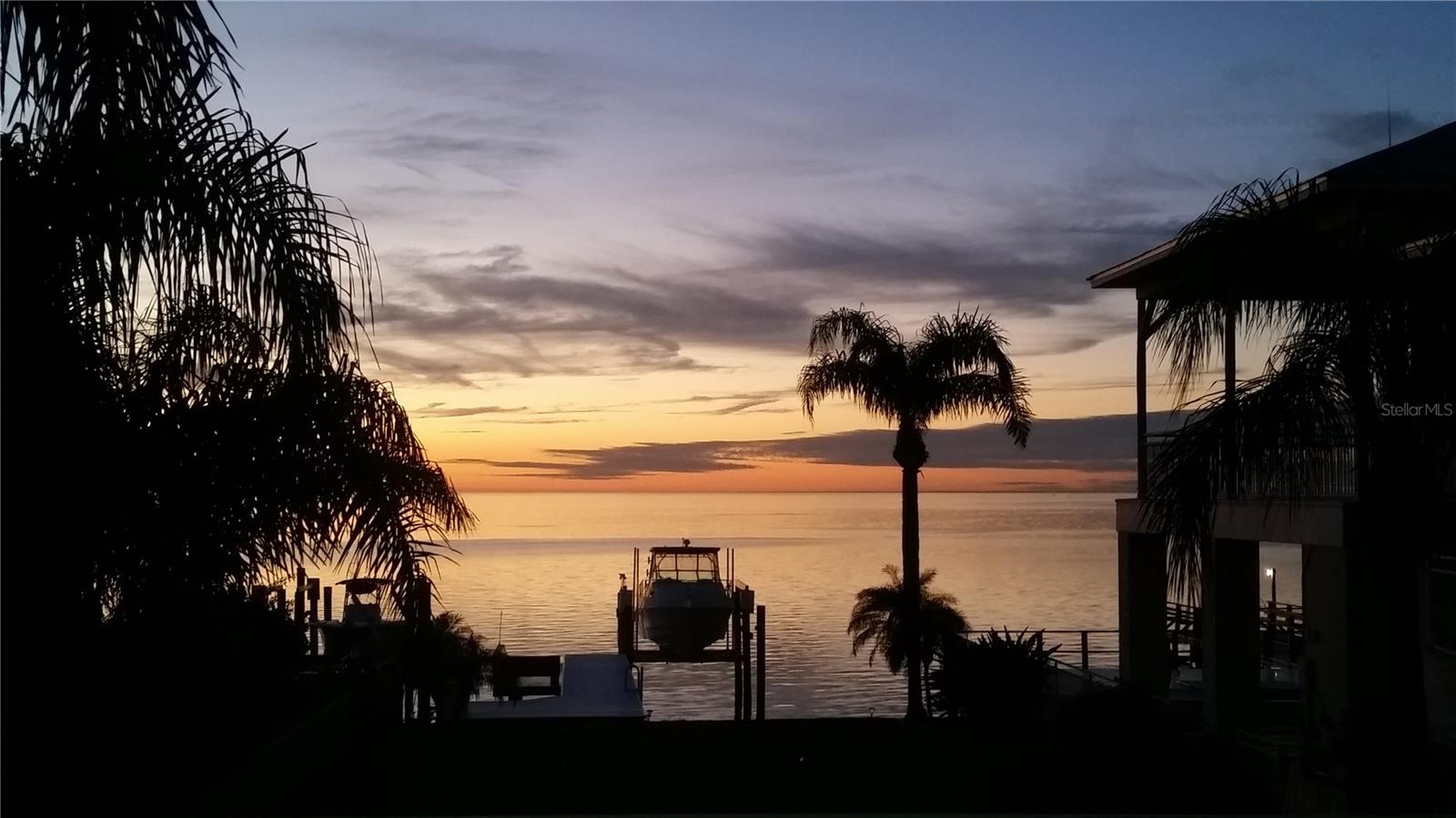 Boat on lift at sunset