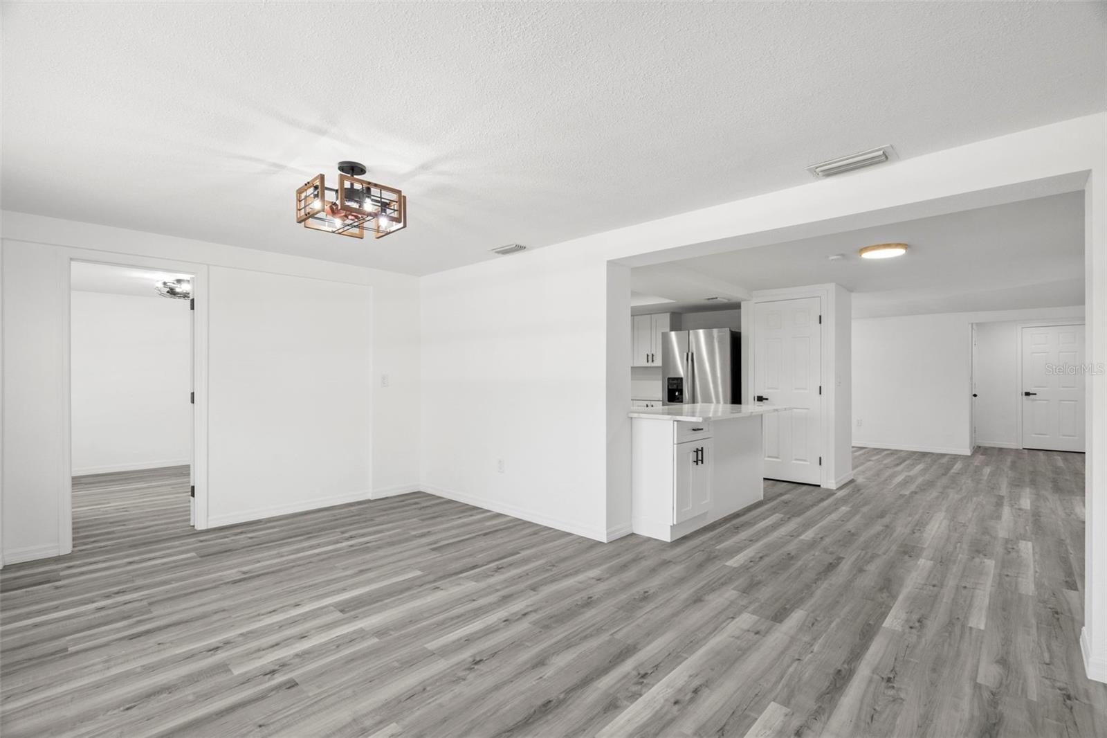 dining space with view of kitchen