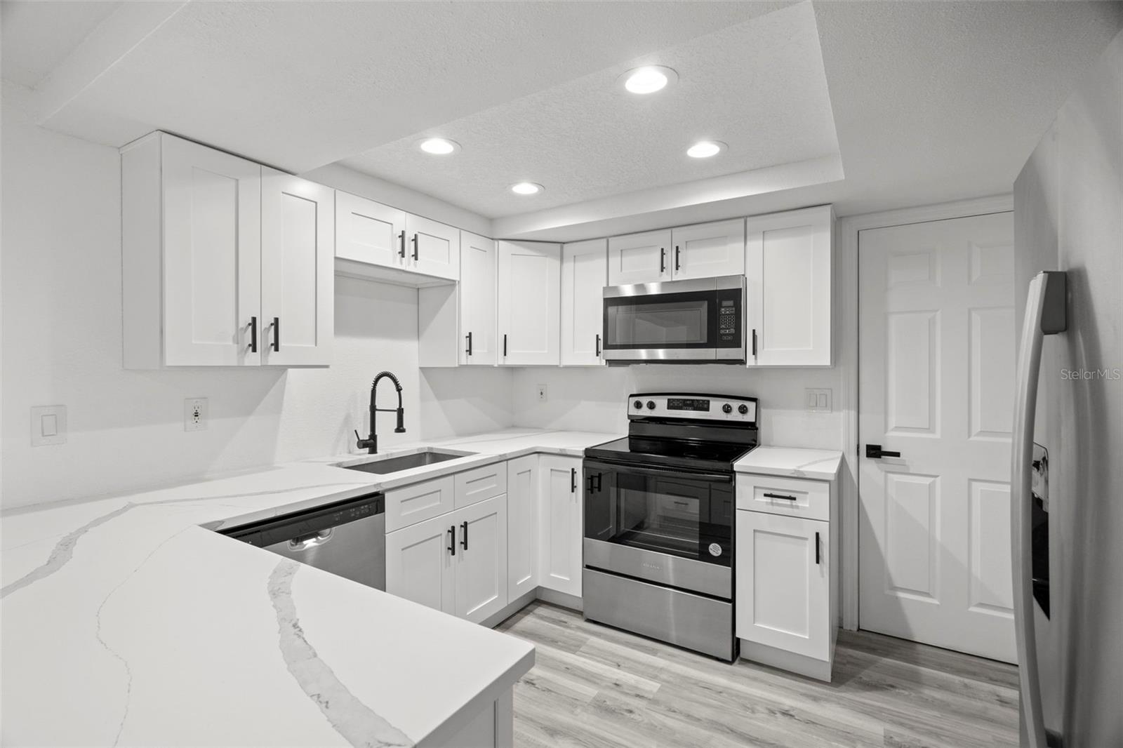 kitchen with garage door view