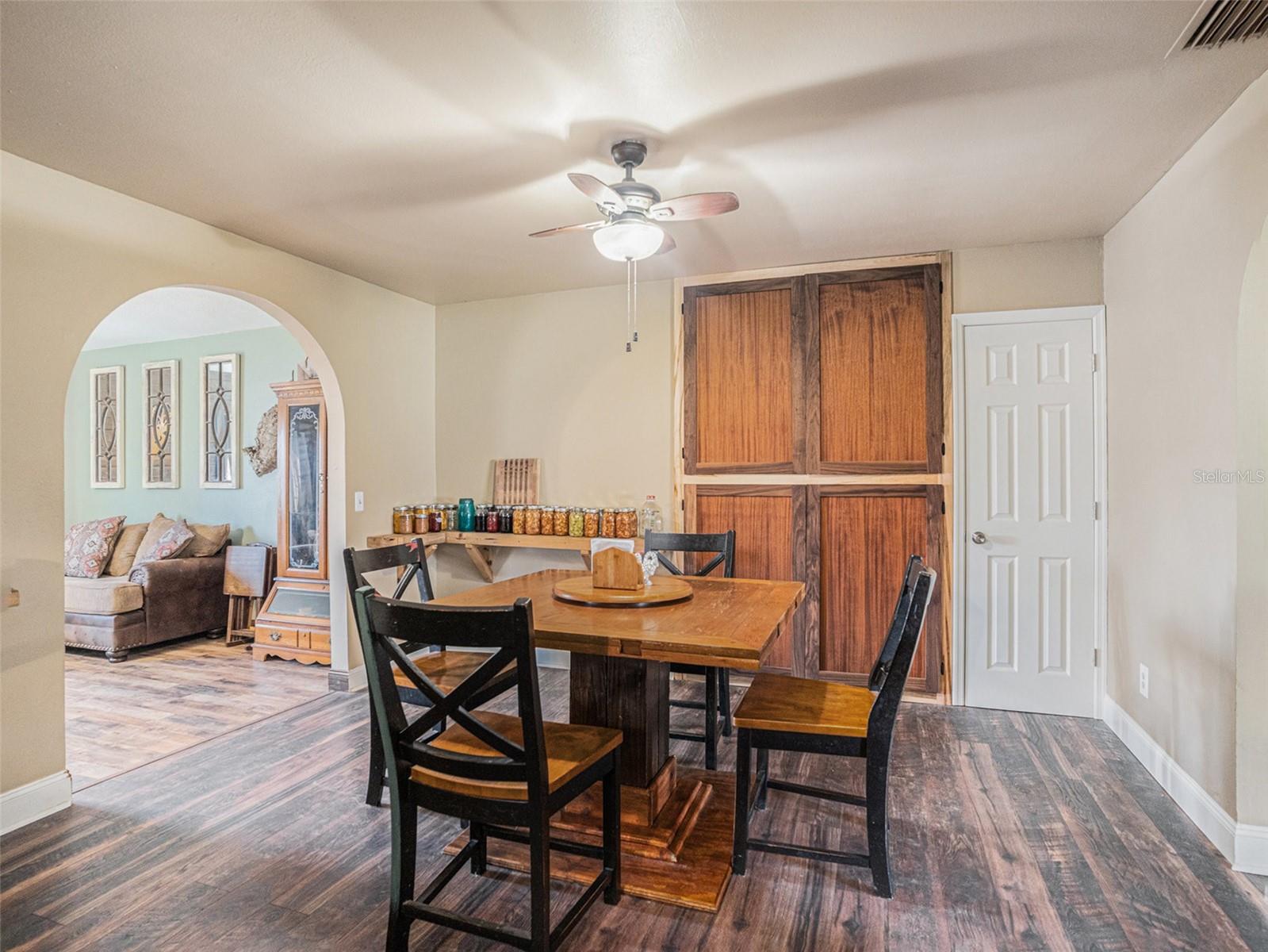 Dining Area with custom wood built in shelves.