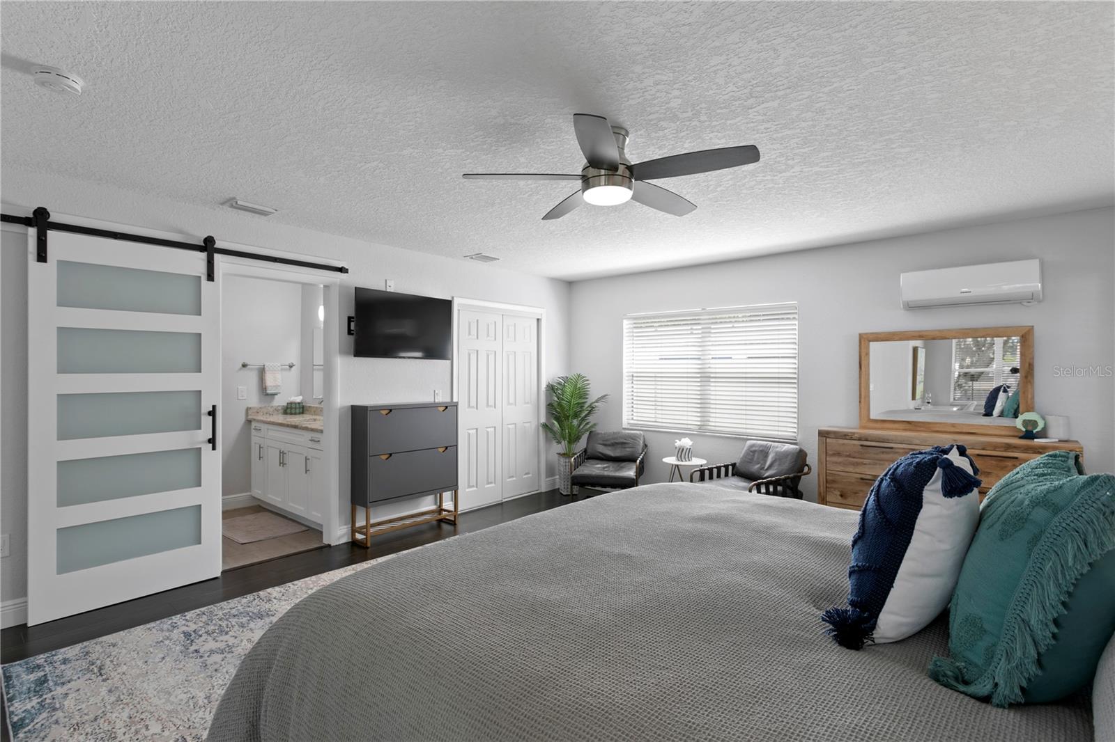 Primary bedroom suite with mini-split