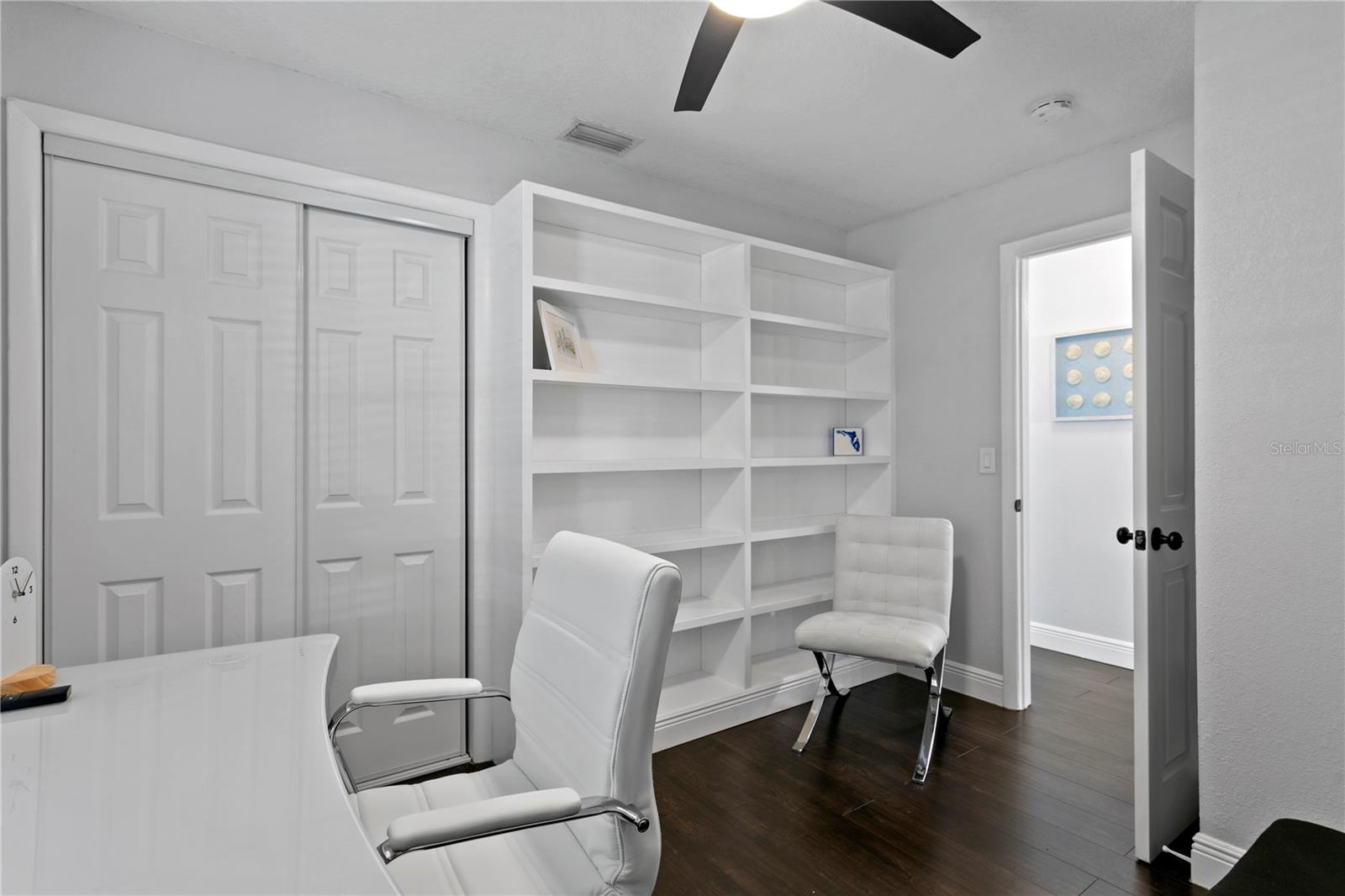 Bedroom 4 with built-in bookcases