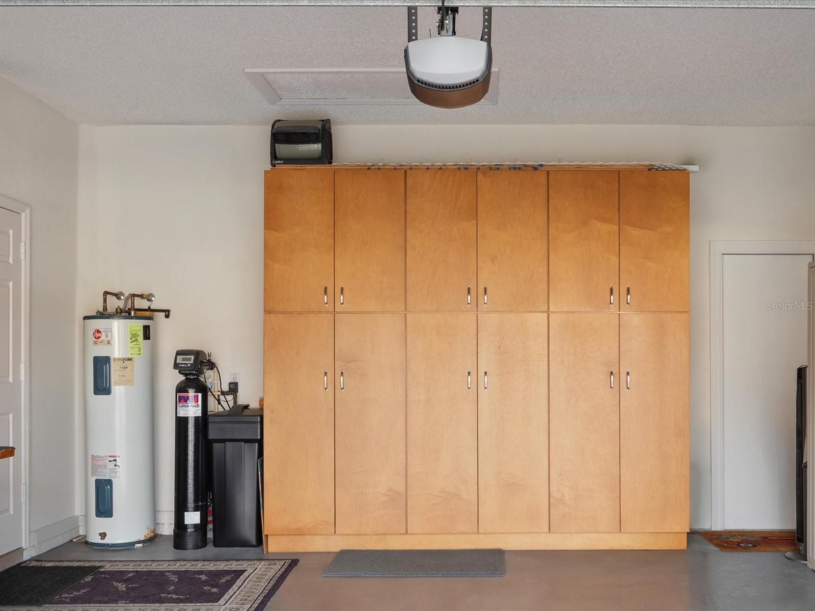 Garage with built in cabinetry