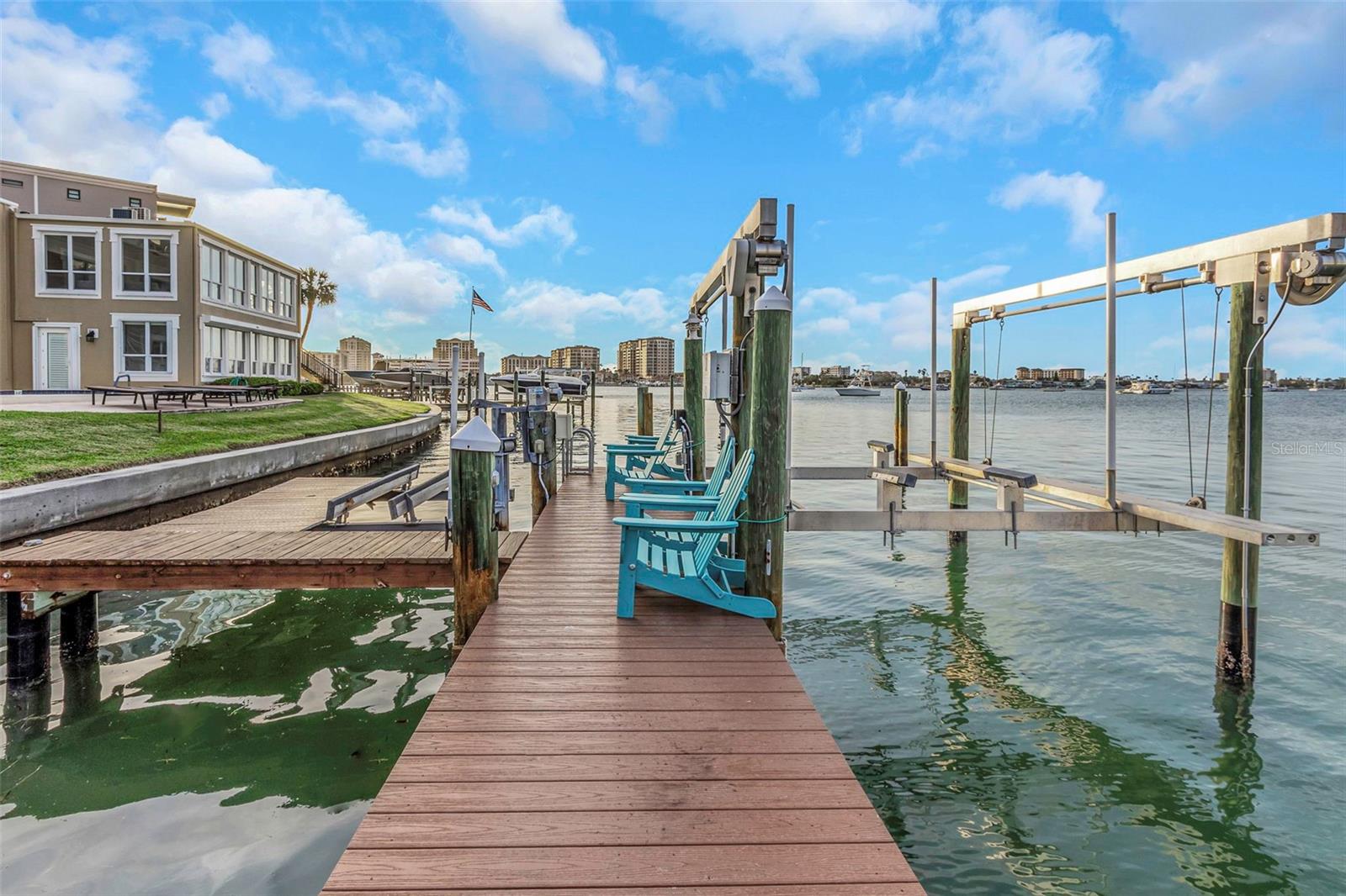 Private boat dock with boat lift and jet ski lift