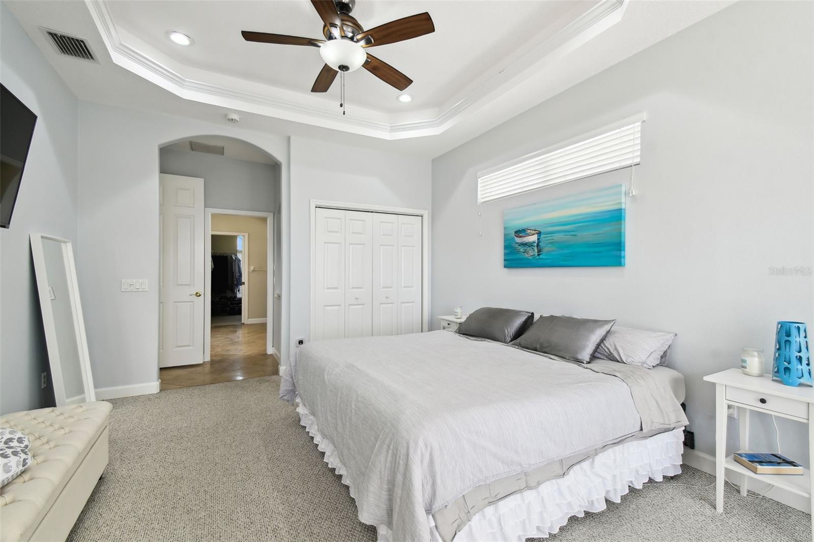 Primary bedroom with adjoining private bath