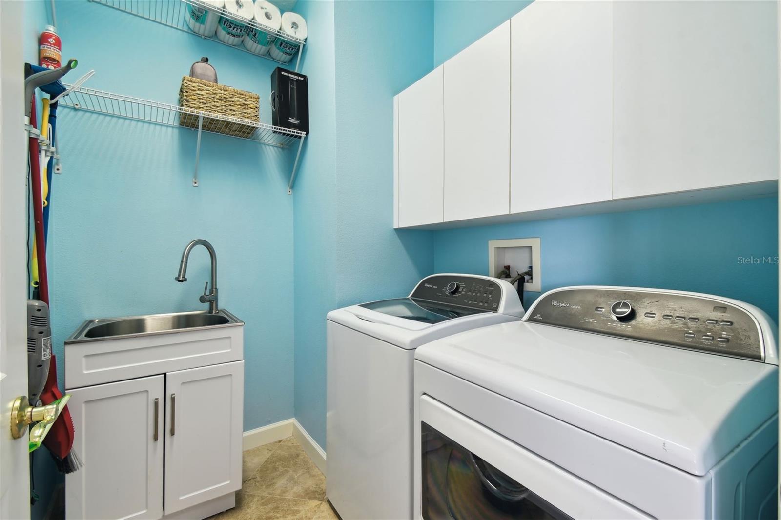 Laundry room off of 3 car garage