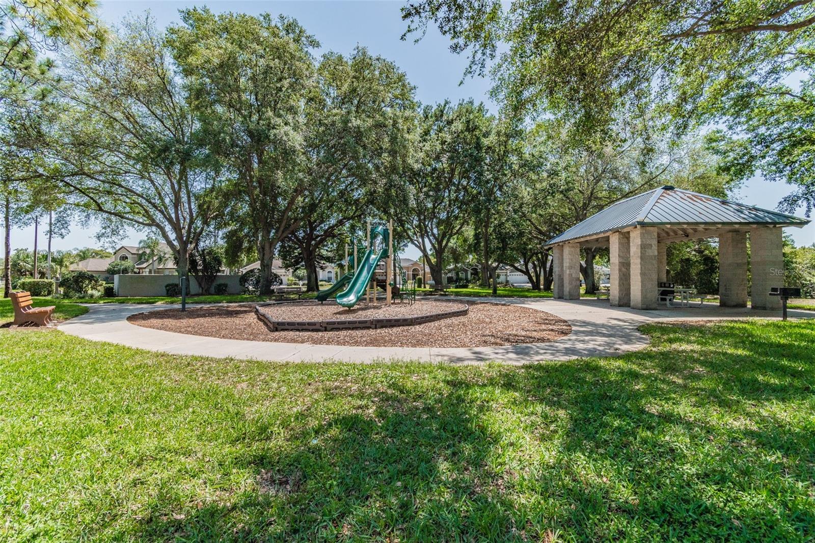 Pavilion and picnic tables for residents and guests.