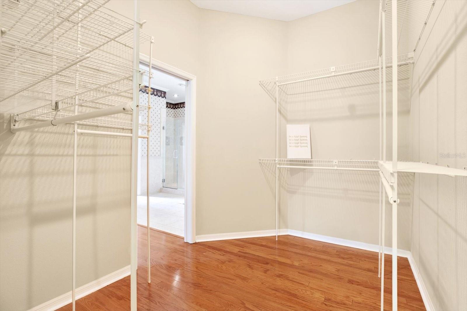 walk in closet in primary (1 of 2)-each closet has an independent washer and dryer hook up