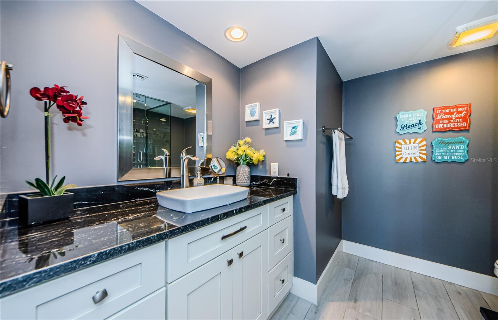 Perfect updated hall bath for guests with a walk in shower!