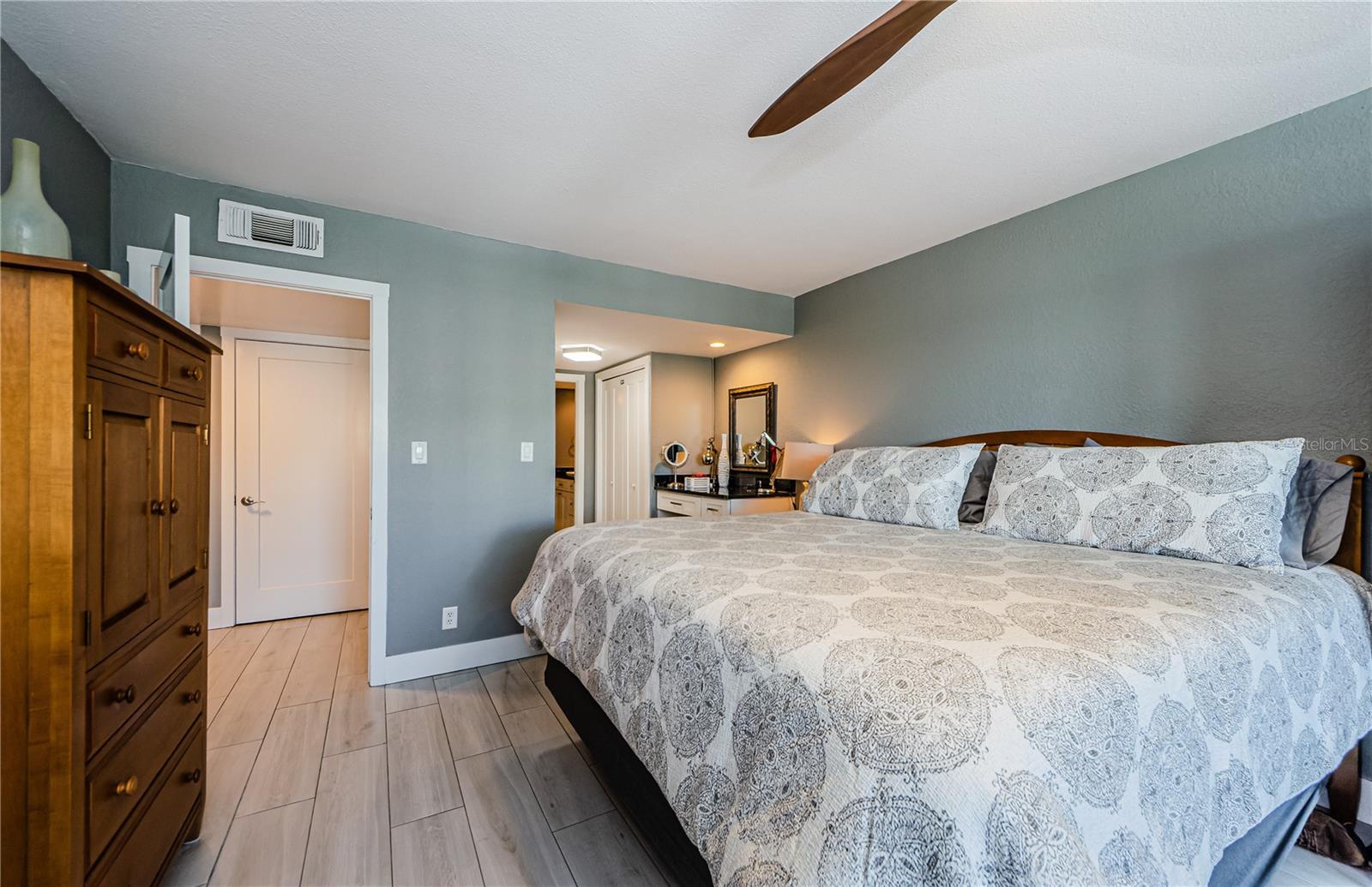 Master bedroom with king bed and ensuite bath.