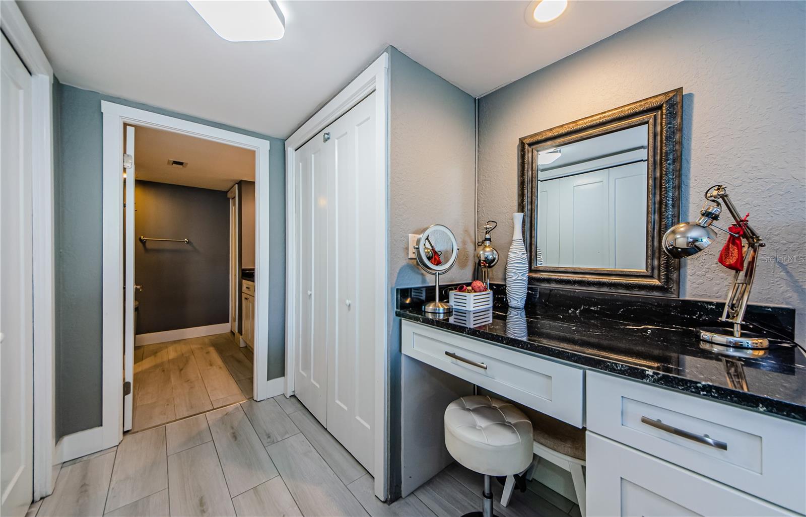 Dressing area with vanity in the master bedroom.