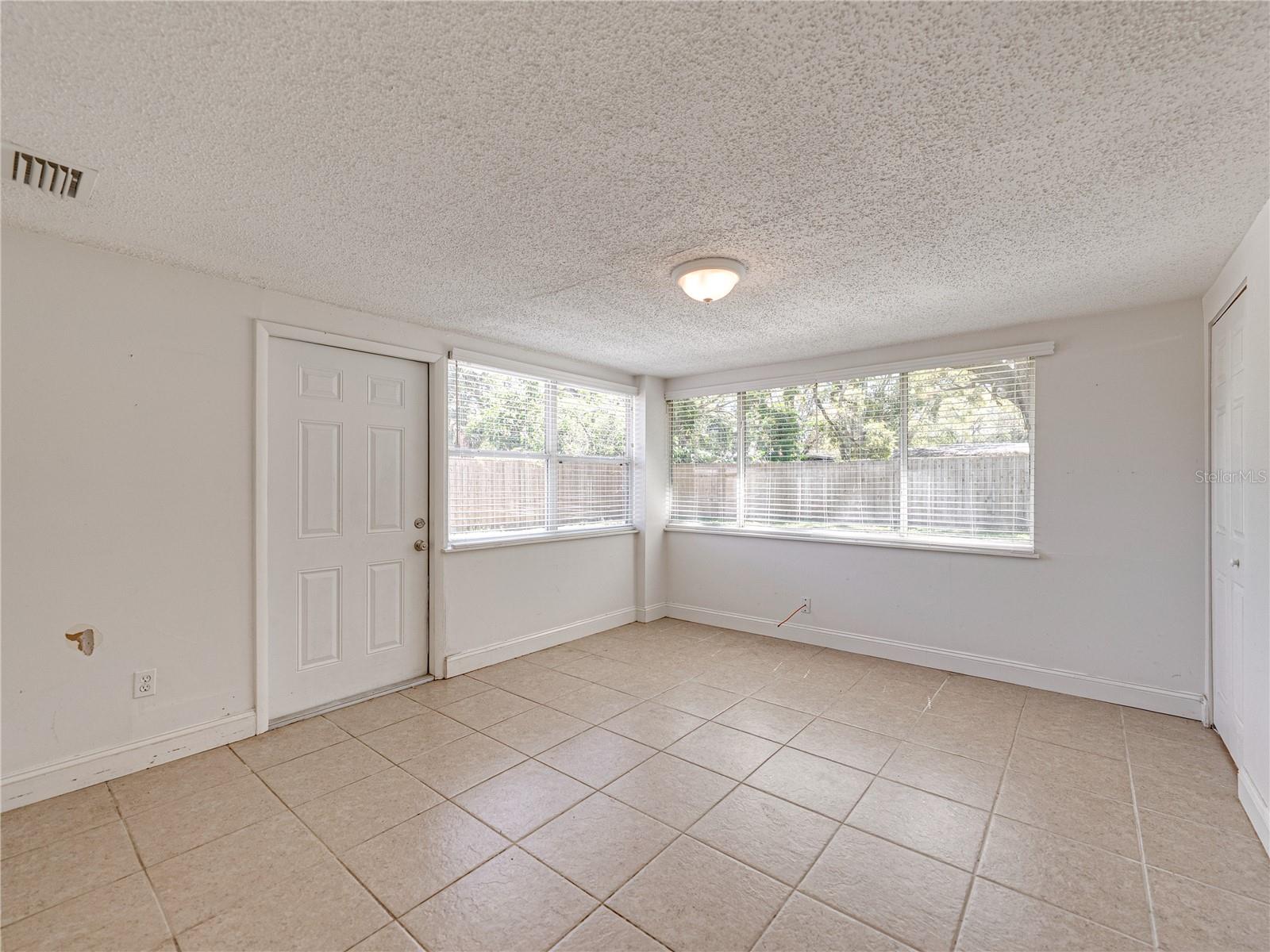 Primary Bedroom with Walkin closet has access to backyard