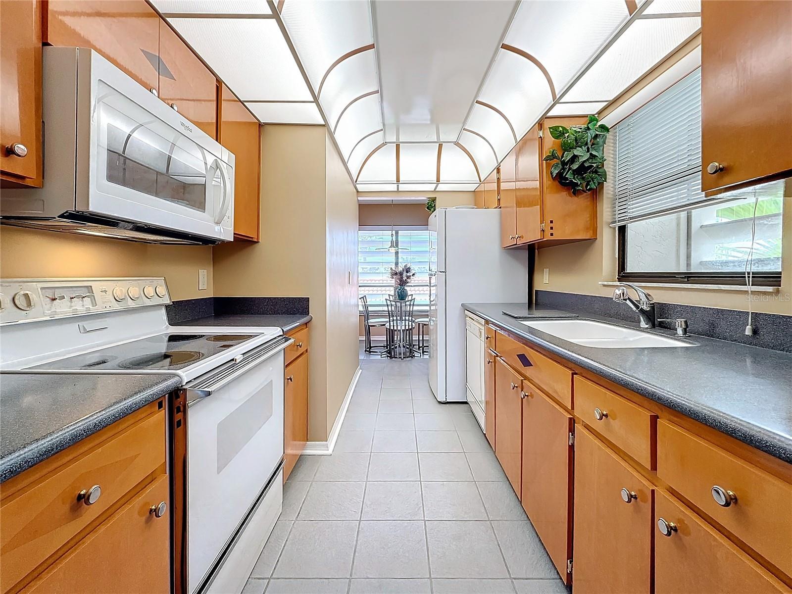 This kitchen offers lots of counter space and cabinets