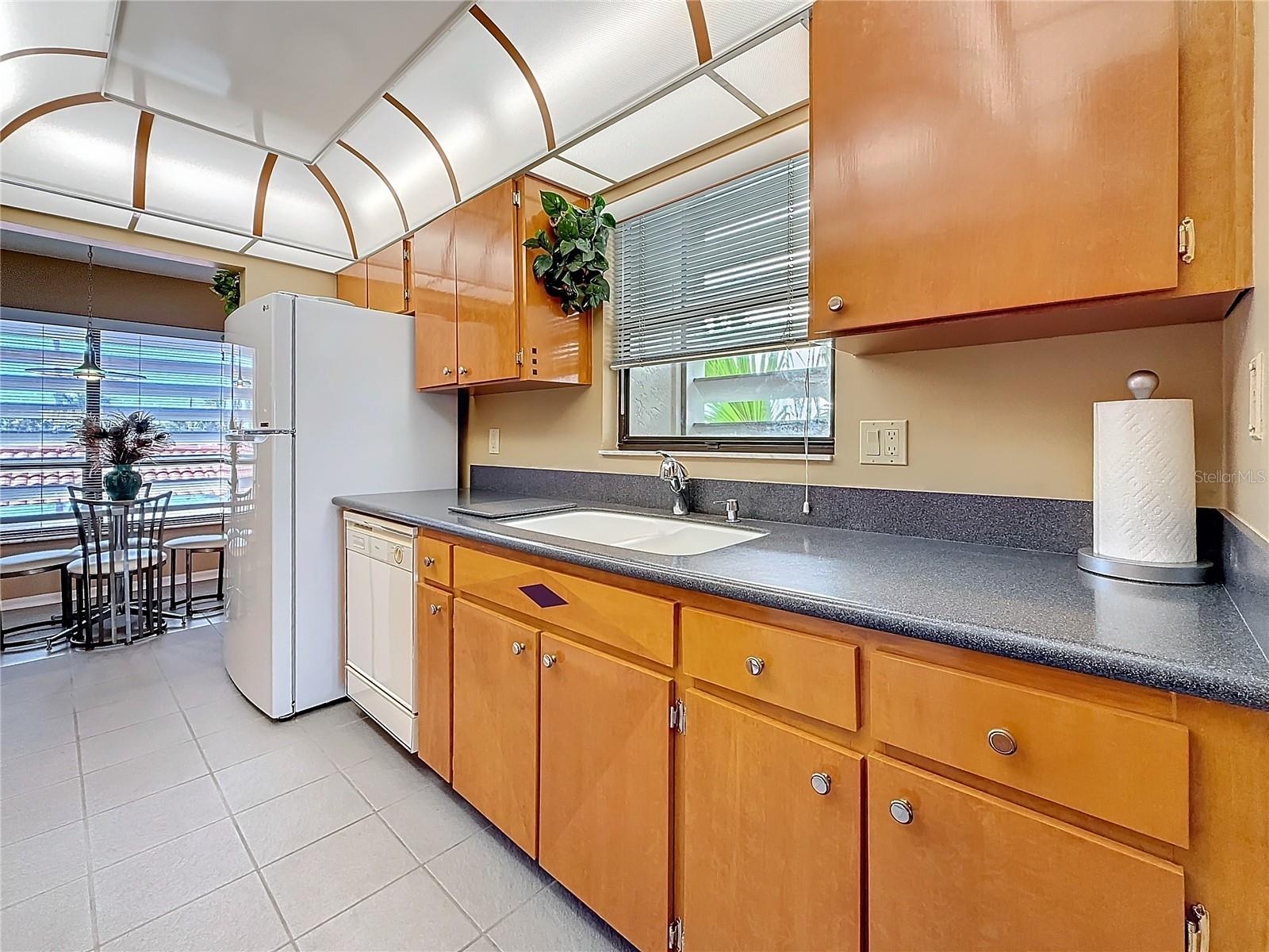 This kitchen is light and bright.  Notice the detail on the front of the cabinet