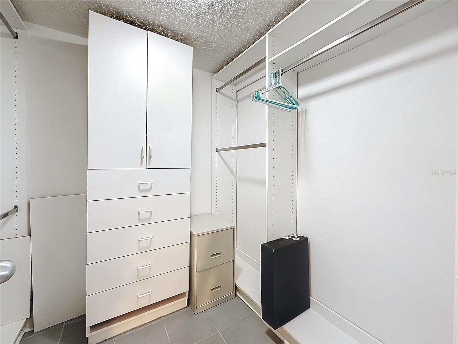 This is the walk-in closet in the 2nd bedroom.