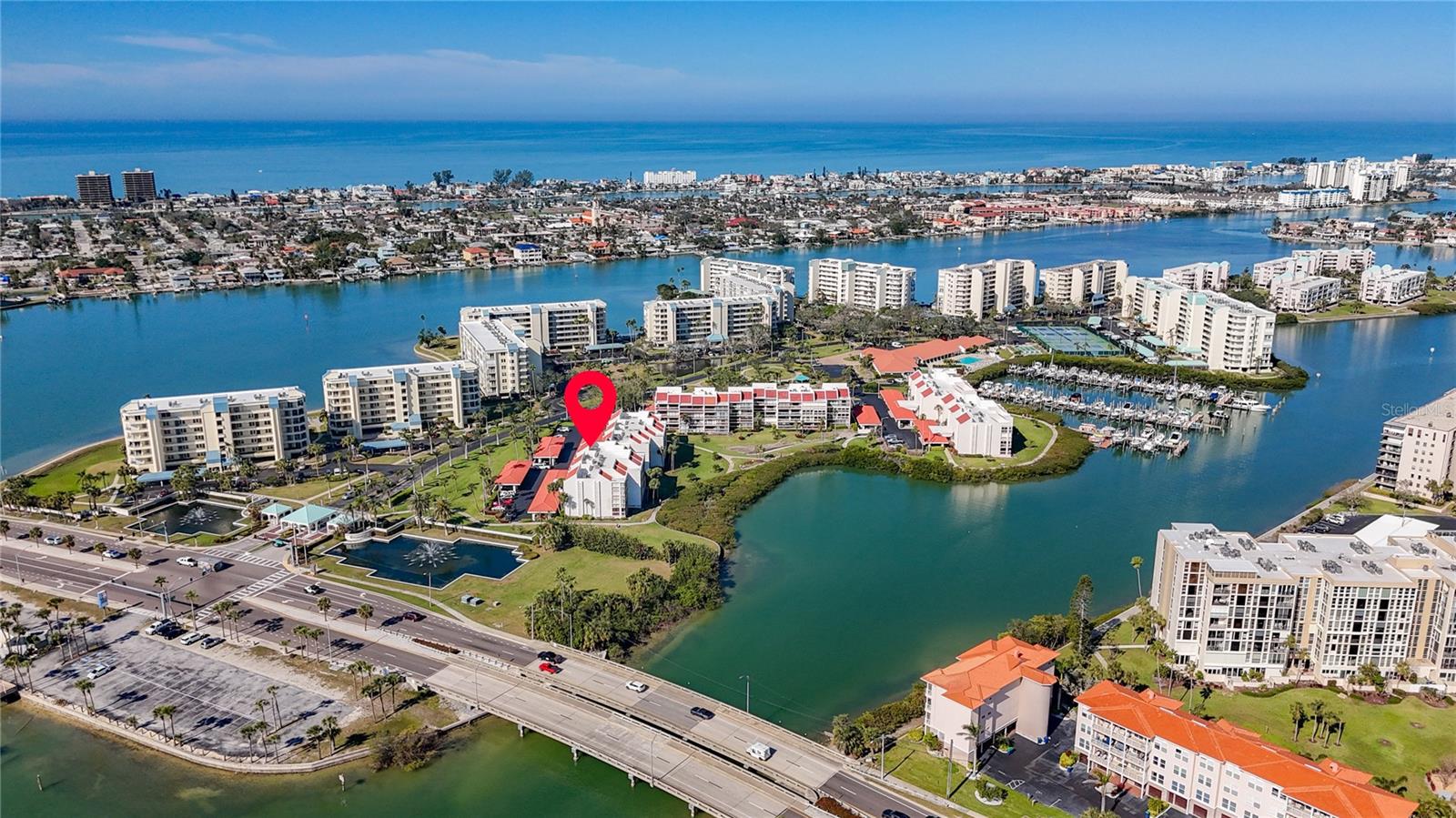 The red arrow reflects the condo building location in the Harbourside community