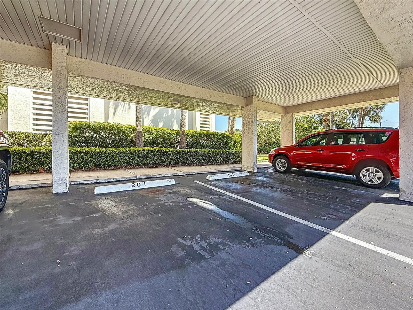 This condo comes with a covered carport