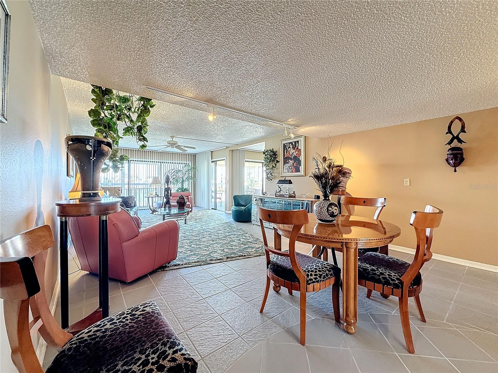 Dining room area with plenty of room to put a larger size table and china closet