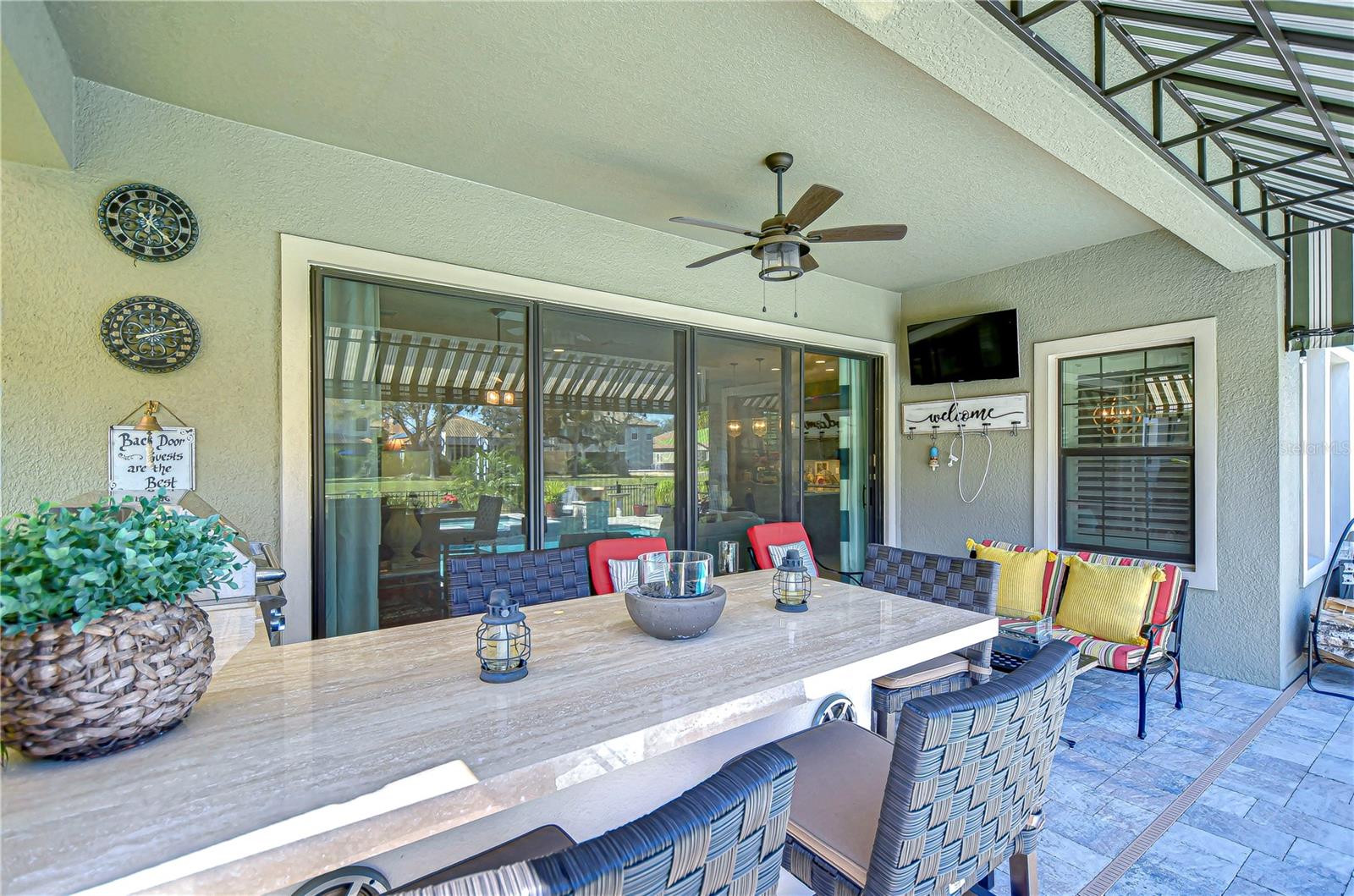 Ideal for Florida evenings, you’ll enjoy comfort and relaxation in this inviting space.